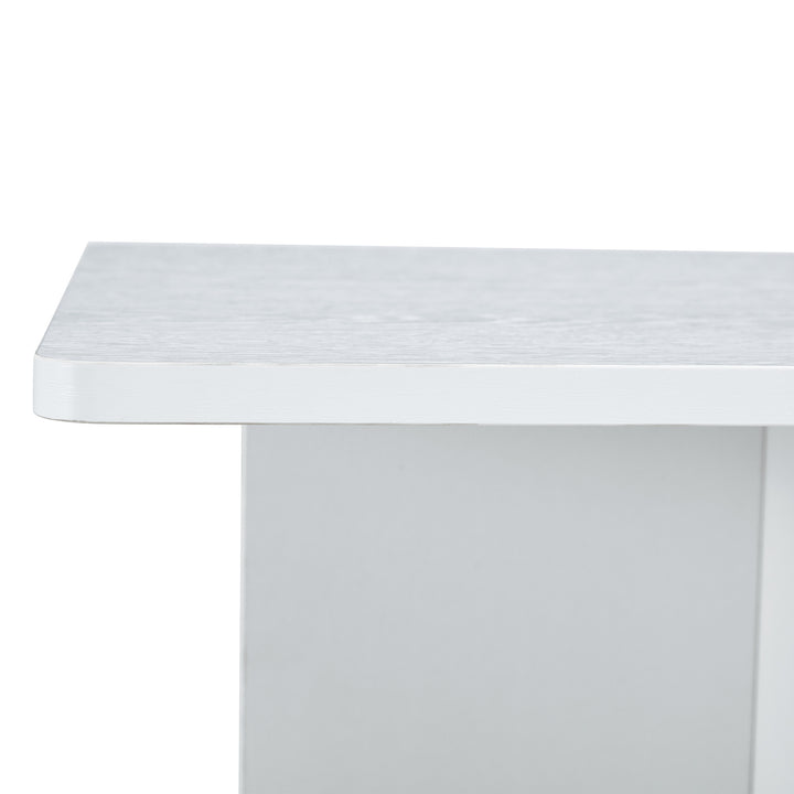 A modern and practical white coffee table. The coffee table is made of medium density fiberboard material, Suitable for living room, bedroom, and study.