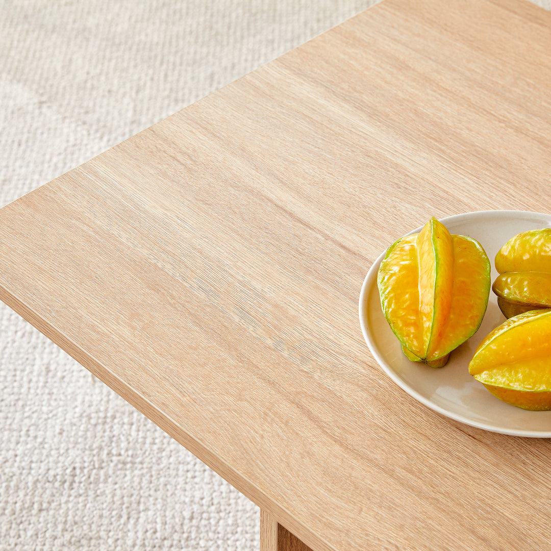 A modern and practical white coffee table. The coffee table is made of medium density fiberboard material, Suitable for living room, bedroom, and study.