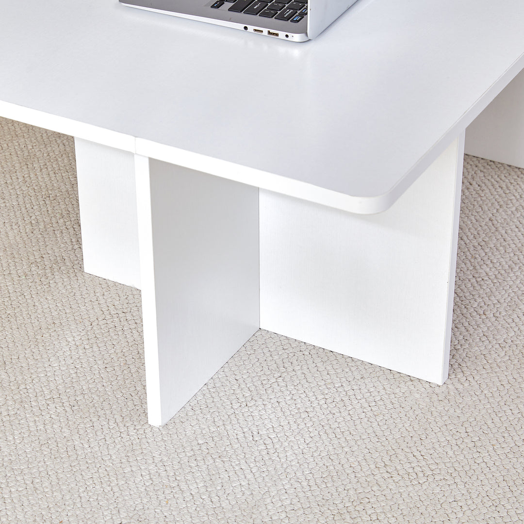 A modern and practical white coffee table. The coffee table is made of medium density fiberboard material, Suitable for living room, bedroom, and study.