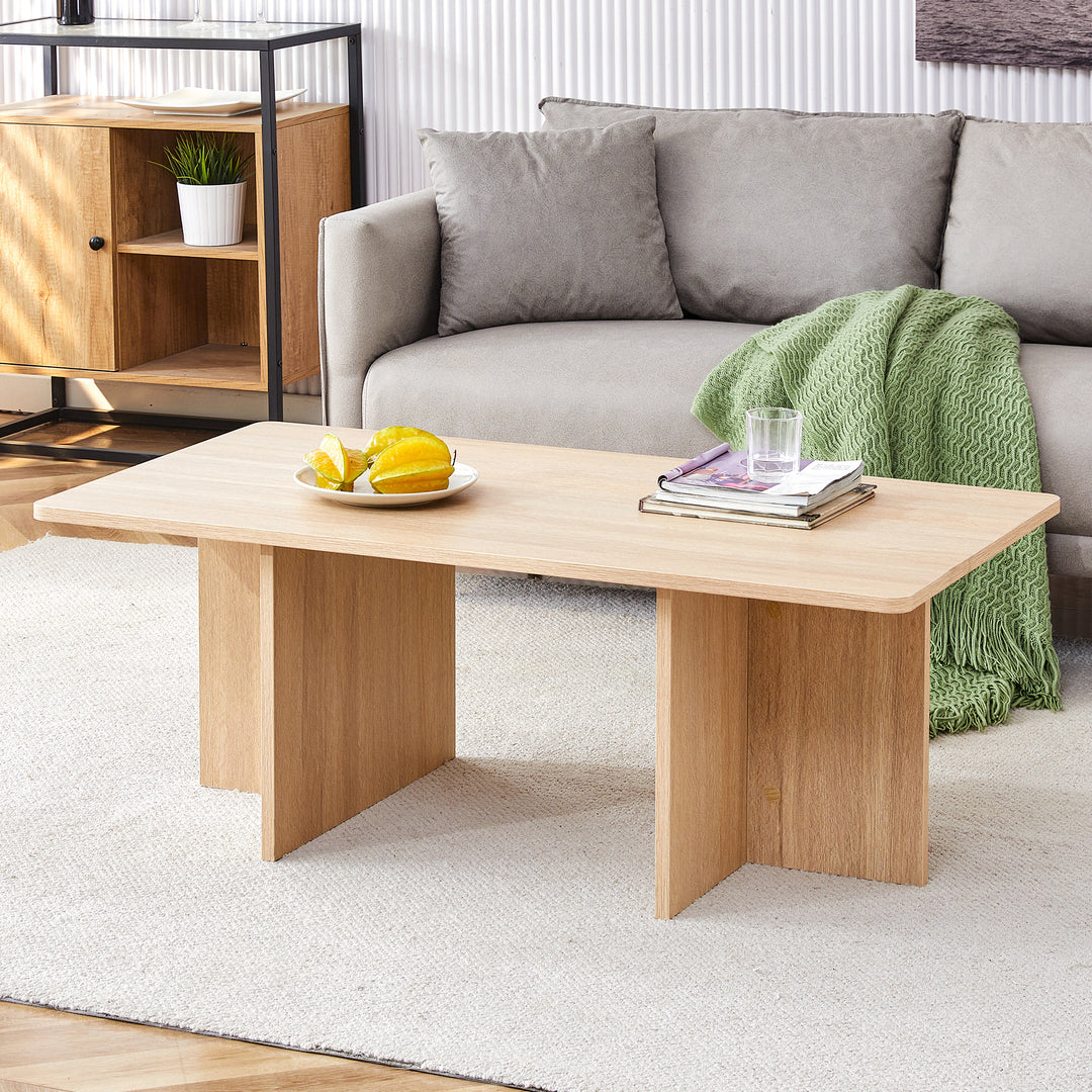 A modern and practical white coffee table. The coffee table is made of medium density fiberboard material, Suitable for living room, bedroom, and study.