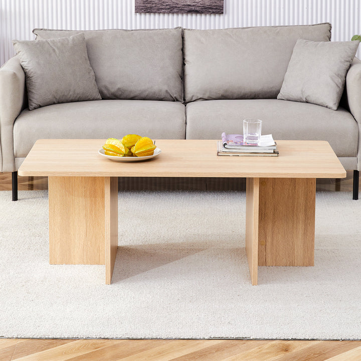 A modern and practical white coffee table. The coffee table is made of medium density fiberboard material, Suitable for living room, bedroom, and study.