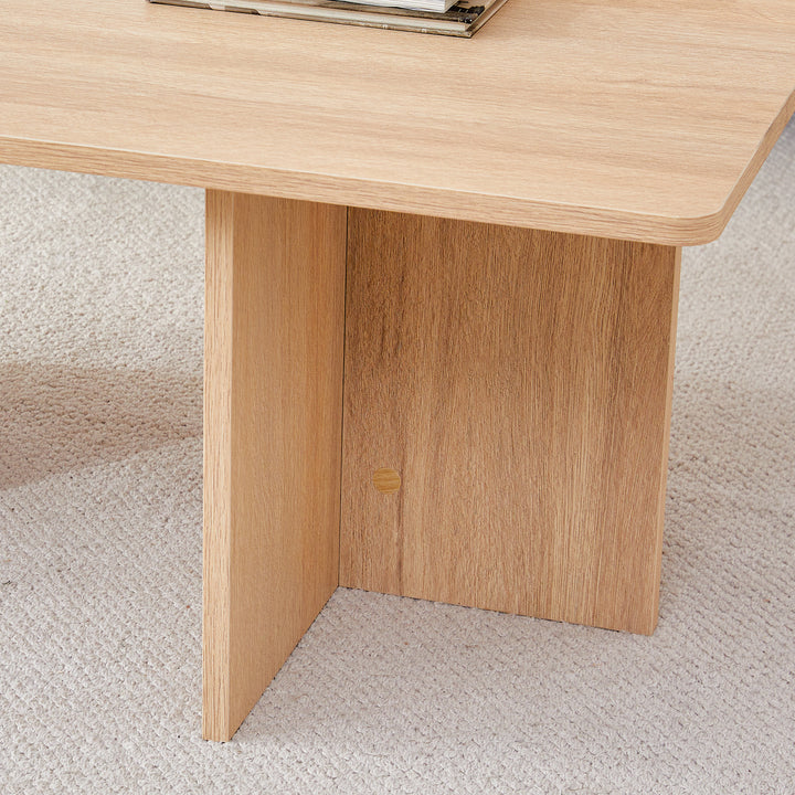 A modern and practical white coffee table. The coffee table is made of medium density fiberboard material, Suitable for living room, bedroom, and study.