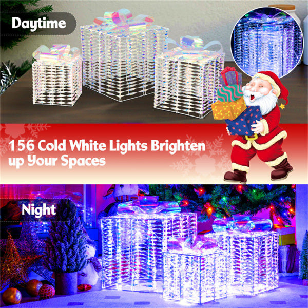 3 glowing Christmas gift boxes with bows